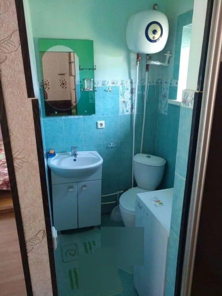 Туалет и раковина в Гостевом доме