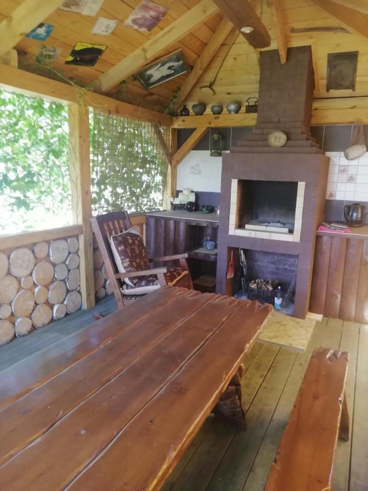 Беседка с печью барбекю