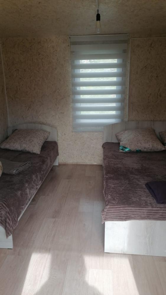 База отдыха "Аил" спальня домика на 3 места