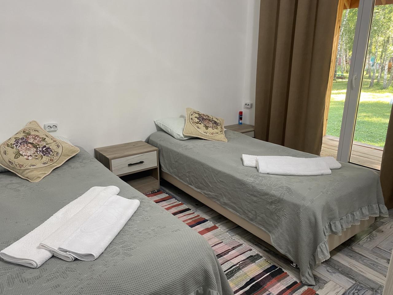 Комната на первом этаже Апартаментов