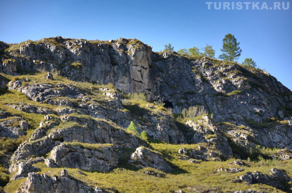 Лицо шамана на скале
