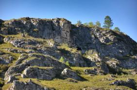 Лицо шамана на скале